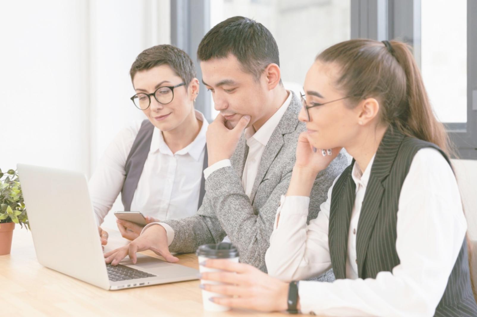 Close-up of financial statements and analytical tools on analyst desk